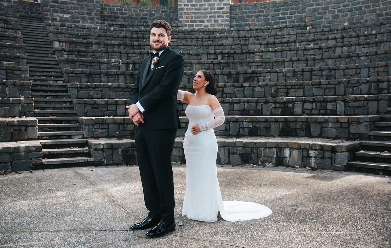 Tia tapping George on the shoulder for their first look in the amphitheatre